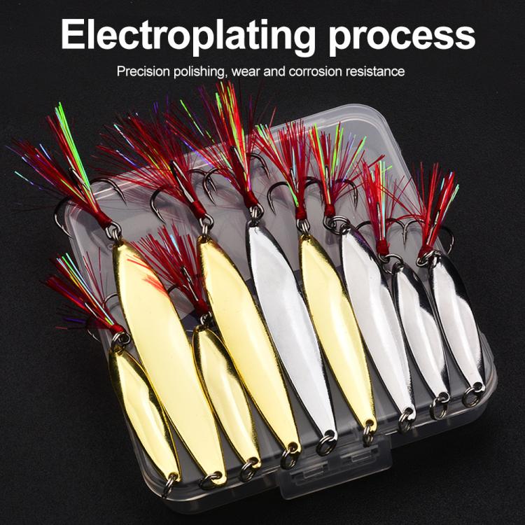 Fishing spoon lure set in clear case: gold and silver blades with red tinsel treble hooks