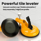 Tile leveling suction cup tool with large black suction base, orange body, and metal knob