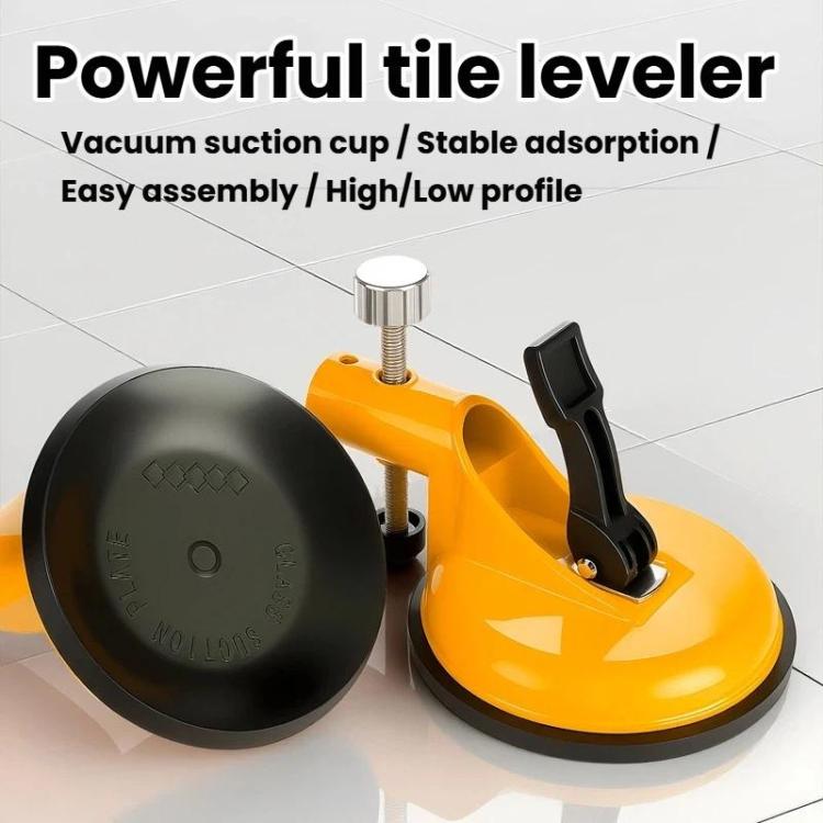 Tile leveling suction cup tool with large black suction base, orange body, and metal knob