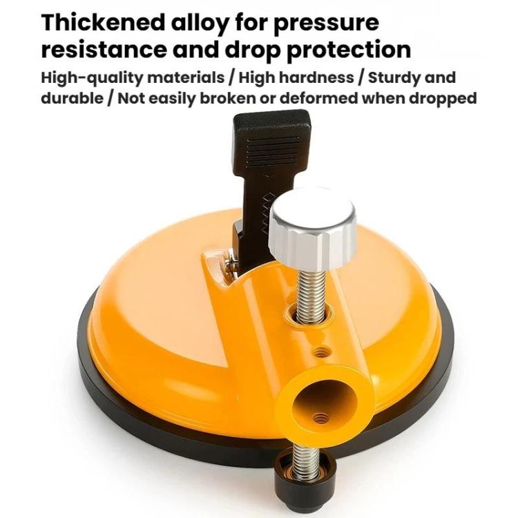 Orange suction base with metal threaded studs and black pressure lever on tile leveling tool