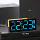 Black digital alarm clock with blue LED time display and size dimensions