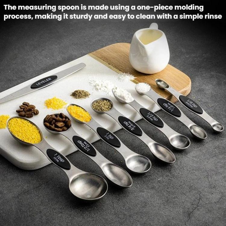 LsCook stainless steel double-ended measuring spoon set on tray with baking markings
