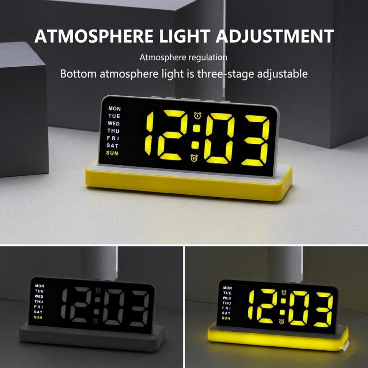 LED mirror desktop alarm clock with yellow digits on black face, yellow base stand