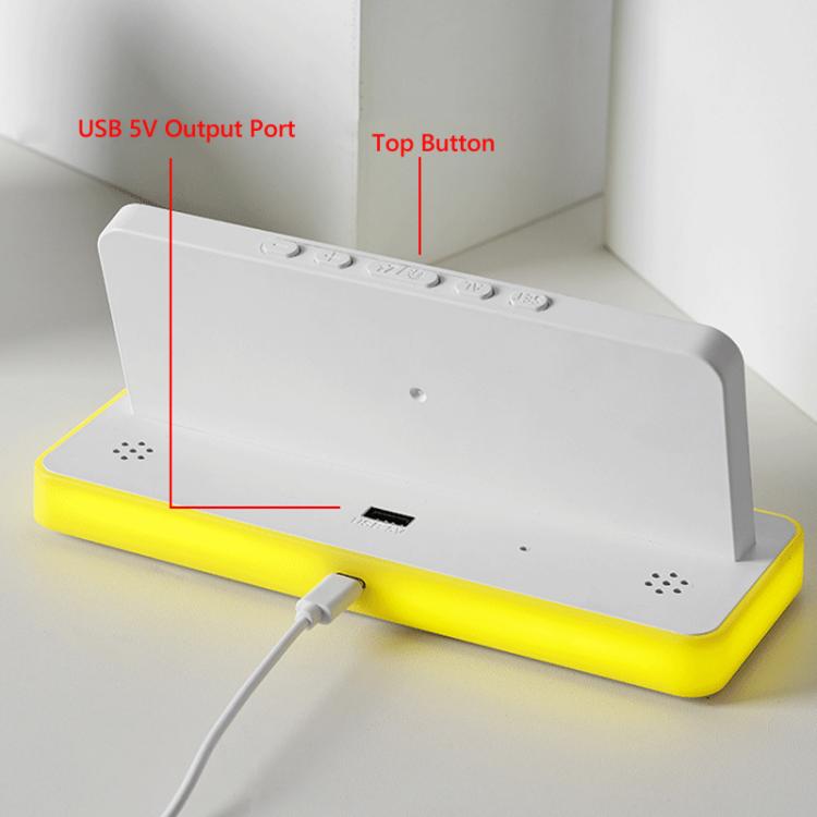 Desktop LED digital alarm clock with white case and yellow base, USB port and button.