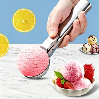Stainless steel dual-purpose ice cream and fruit ball scoop with pink scoop in use