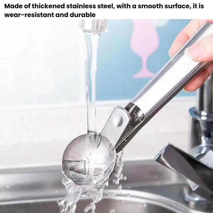 Stainless steel ice cream and fruit ball scoop dispensing in kitchen sink