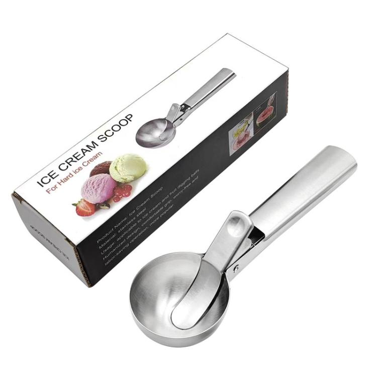 Stainless steel dual-purpose scoop shown with retail box packaging