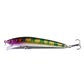 Fishing lure, purple and green reflective body with gold top, two treble hooks