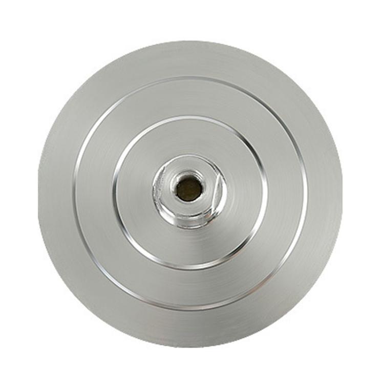 Round metal grinding disc with central threaded hole and concentric rings