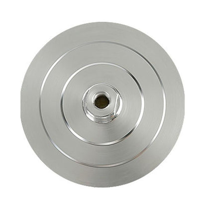 Round metal grinding disc with central threaded hole and concentric rings