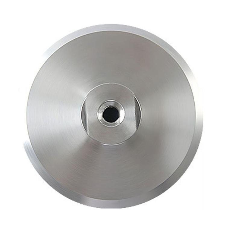 Flat metal grinding disc viewed from an angle, showing central threaded hole