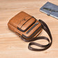 Men's small crossbody bag in brown PU leather with two front zipper pockets