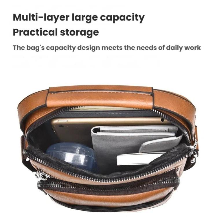 Brown vertical crossbody bag open interior with zip compartments for essentials