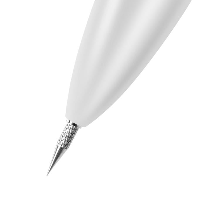 Close-up of the metallic needle tip on a white beauty removal pen