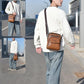 Men's brown crossbody shoulder bag with front zip pocket and logo flap, worn with strap