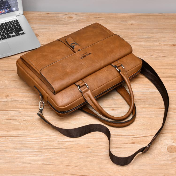 Men's vintage business tote bag in tan with flap front, buckle, and shoulder strap