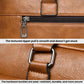 Tan leather-look business bag hardware: zip pull and reinforced strap buckle