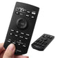 Black car audio DVD remote controller held in hand; second remote beside it