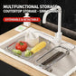 Expandable sink colander strainer with fine mesh basket holding vegetables in sink