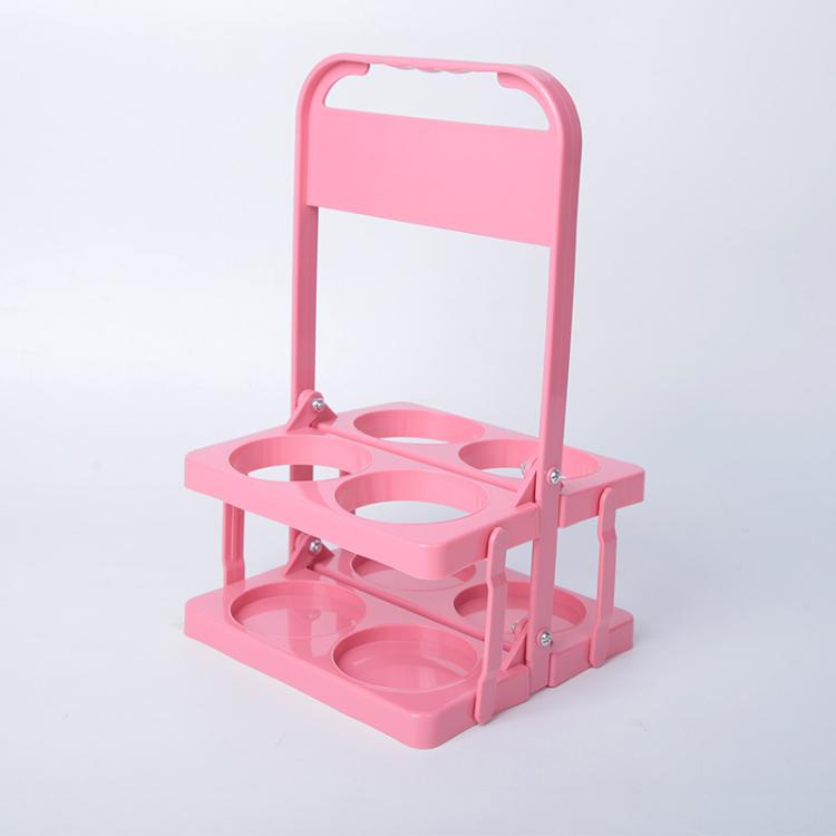 Pink 4-hole foldable plastic drink carrier with carry handle