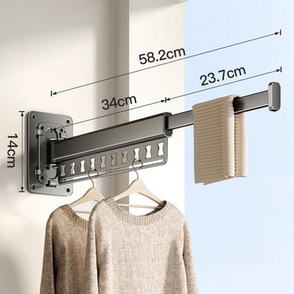 Wall-mounted folding clothes drying rack with dark grey frame and hanging pegs