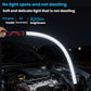 Handheld flexible LED light strip illuminating a car engine bay with a bright white arc