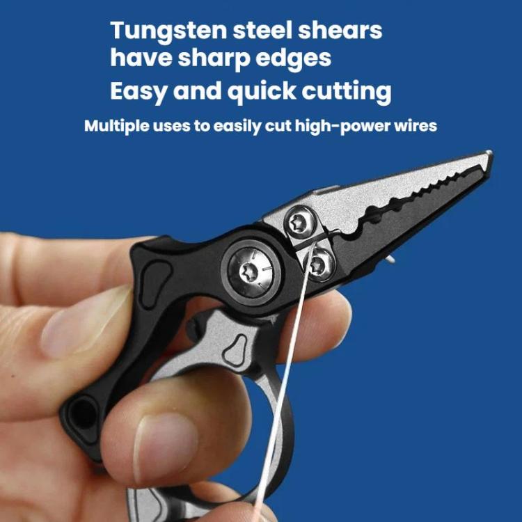 Mini fishing line cutter pliers in hand, showing serrated cutting blades, black and silver.