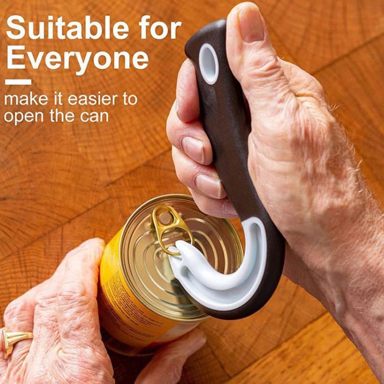 Multifunction can opener in use on a metal can, black handle with white cutting wheel