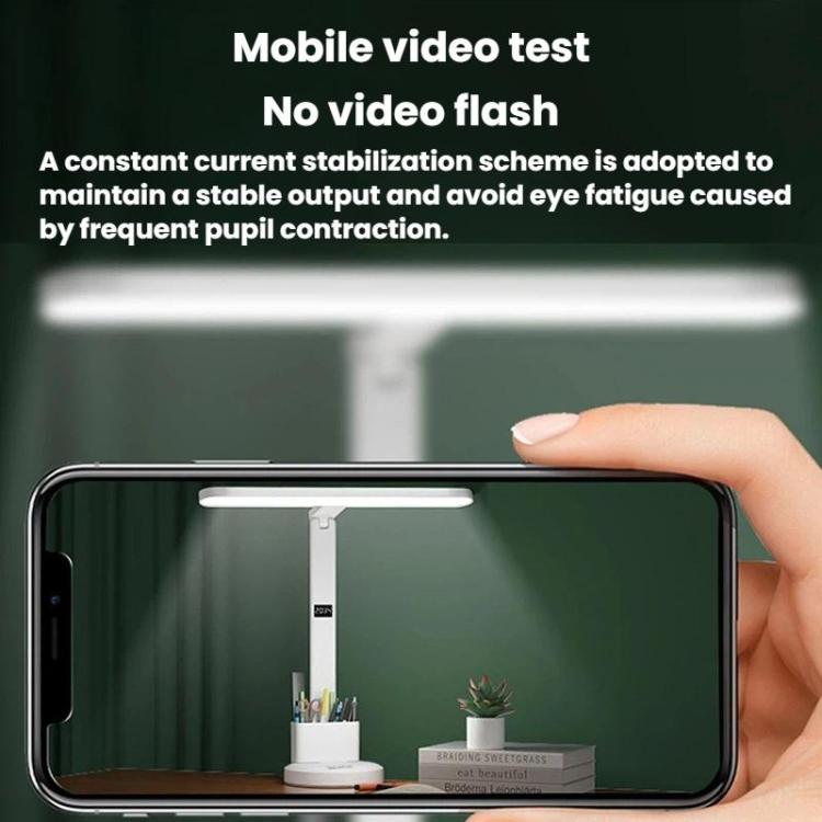 White LED desk lamp with slim light bar beside a smartphone