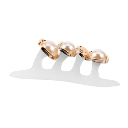 Soft silicone toe separator nail tool with three gold-tone bands and pearl beads
