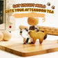 Cat-shaped stainless steel cookie cutter holding a baked cat cookie on a board