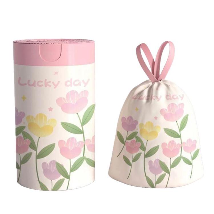 Floral drawstring trash bag roll with tulip pattern, pink and white tones