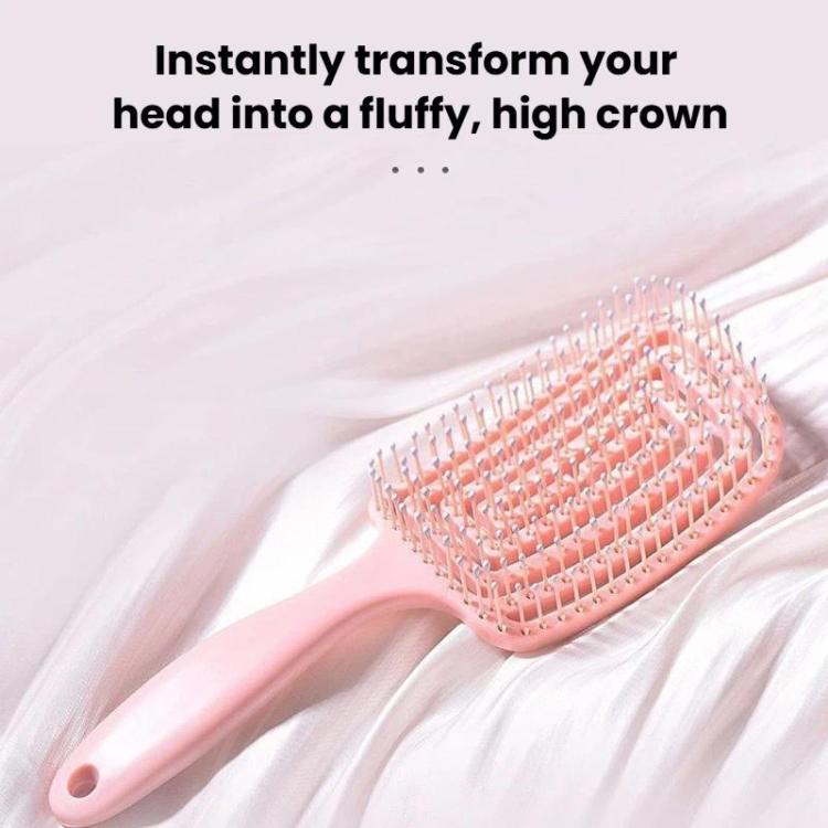 Pink hair massage comb with hollow rib back and wide rectangular brush head