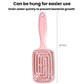 Purple hair massage comb with hollow ribbed paddle and loop handle