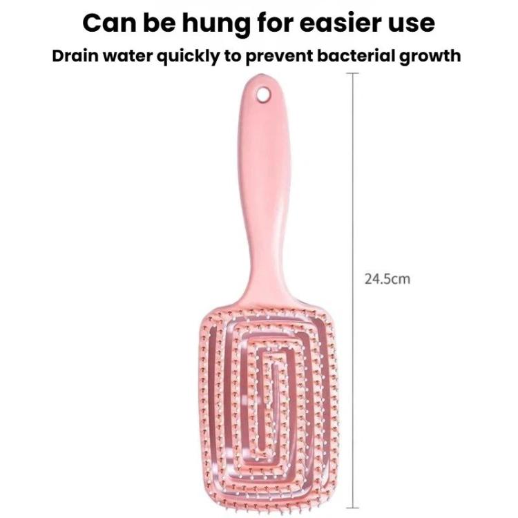 Purple hair massage comb with hollow ribbed paddle and loop handle