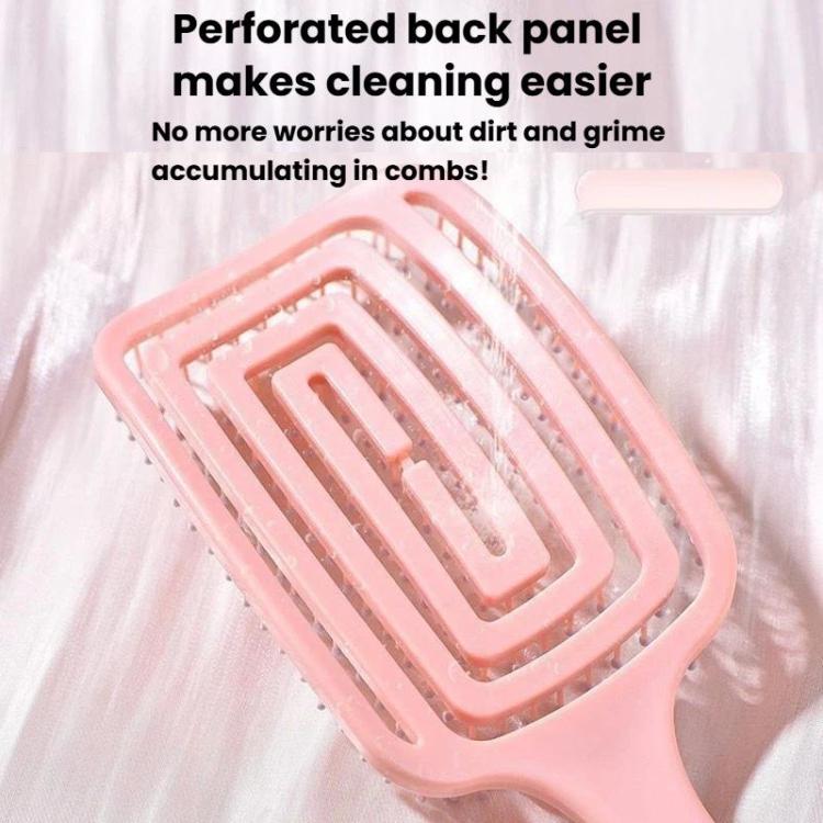 Pink perforated back panel on a hair massage fluffing comb