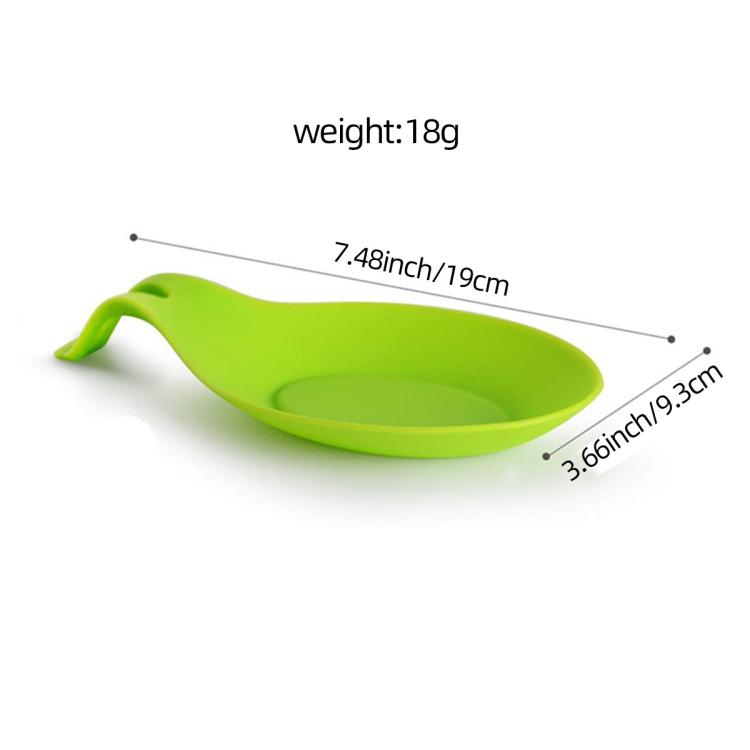 Green leaf-shaped kitchen mat with side handle and raised outer rim
