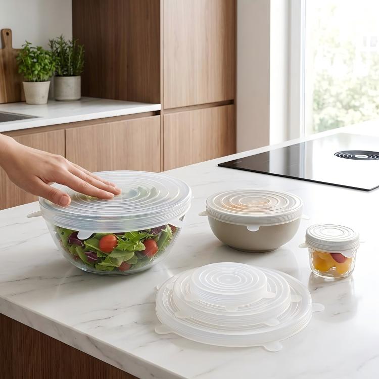Clear round silicone food storage lids set, with raised rim and grip tabs