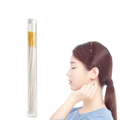 Disposable ear piercing cleaning floss sticks in a clear tube, single pack