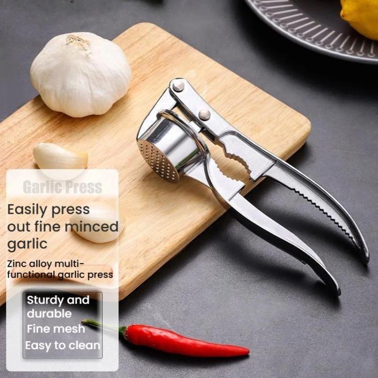 Stainless-style garlic press tool with long handle and perforated crushing mesh cup