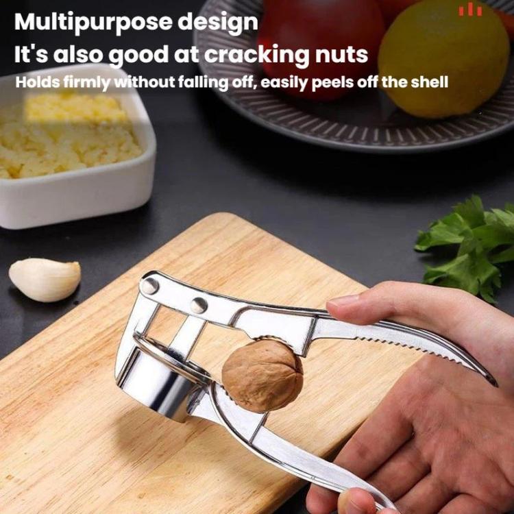 Garlic press with scalloped blade for shell cracking and a comfortable hand grip
