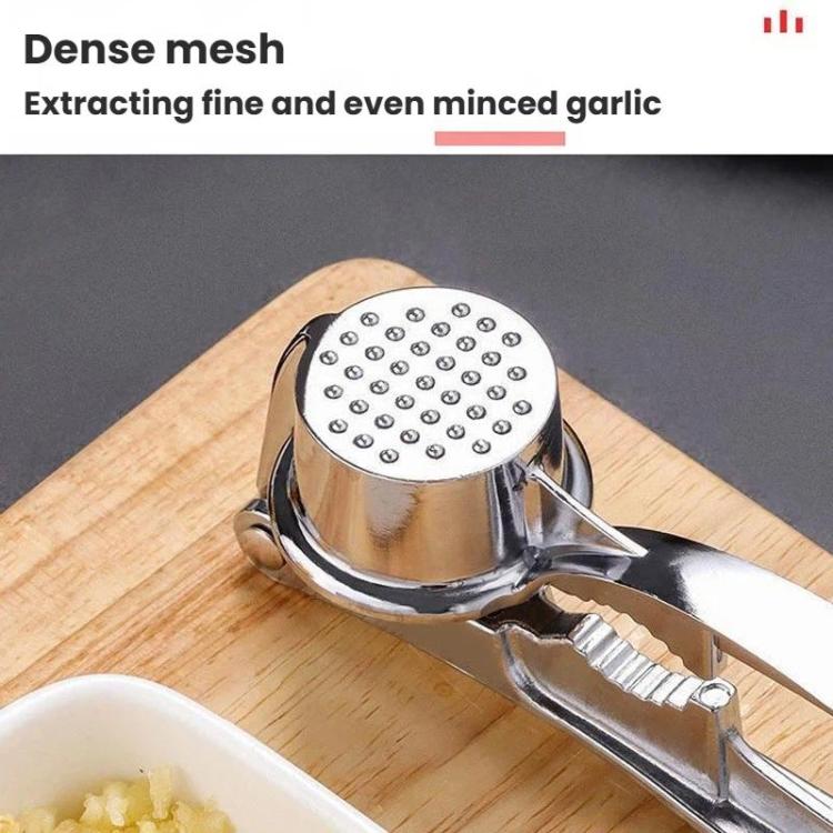 Close-up of garlic press mesh cup and hinged pressing plate for fine minced garlic