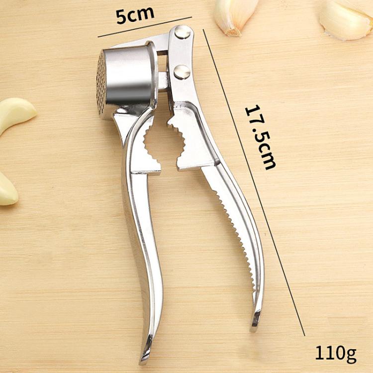 Compact manual garlic press with labeled size markings and 110g weight on board
