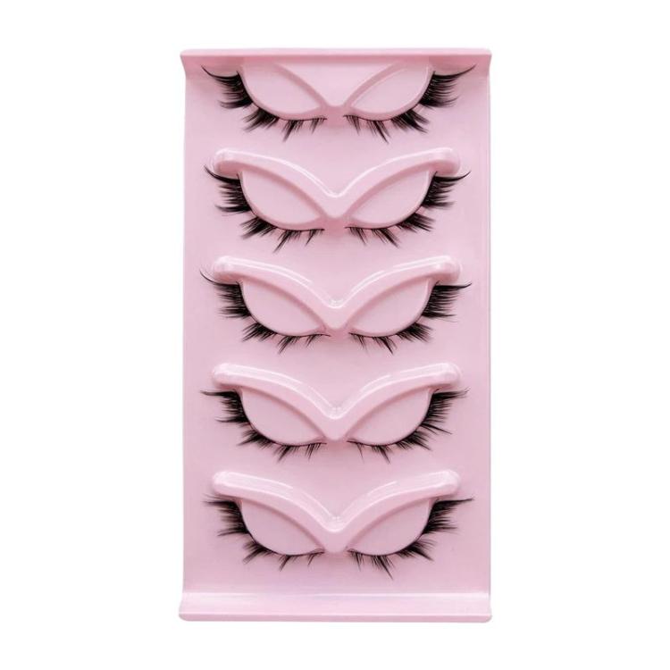 Set of five black fluttery fox-style false eyelashes on a pink display tray