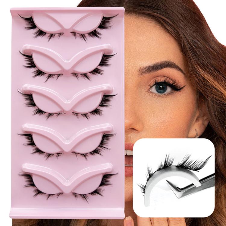 Black false eyelashes shown on pink tray, with a close view of the lash style