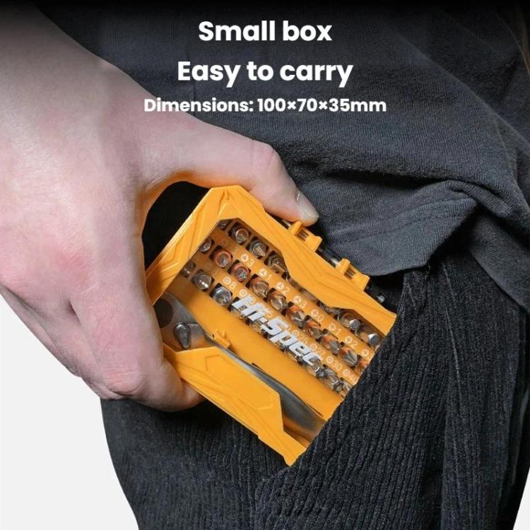 Orange screwdriver bit kit in a compact case held in hand