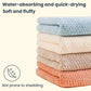 Stack of pastel coral fleece drying cloths in assorted colors