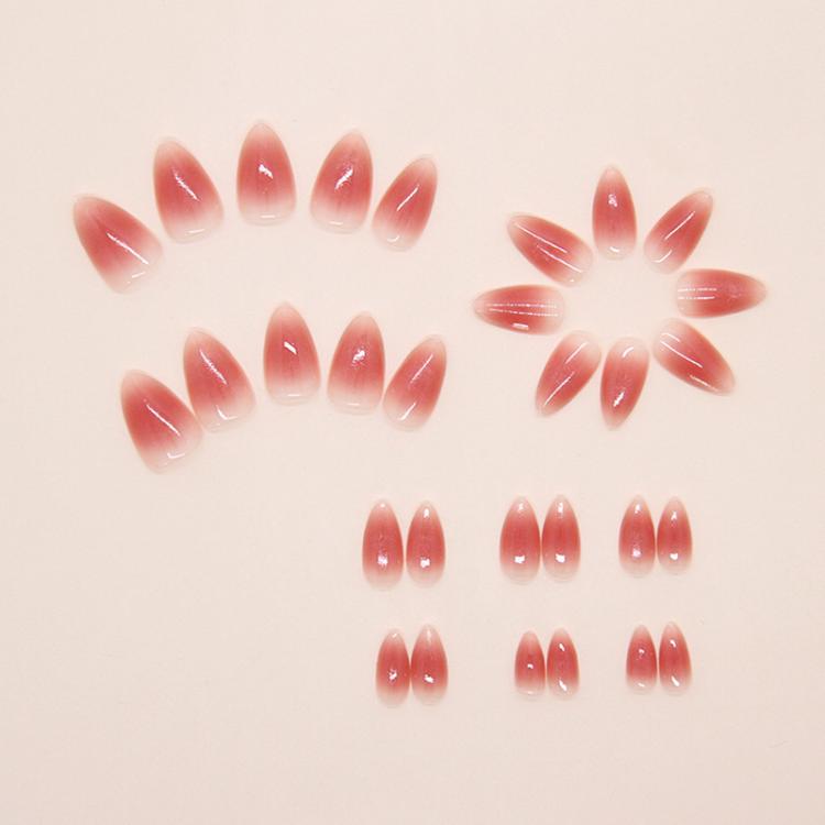 Set of translucent jelly pink short almond press-on nails with glossy ombre glitter tips