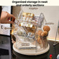 Clear rotating vanity organizer with drawer-like sections and hanging accessory areas