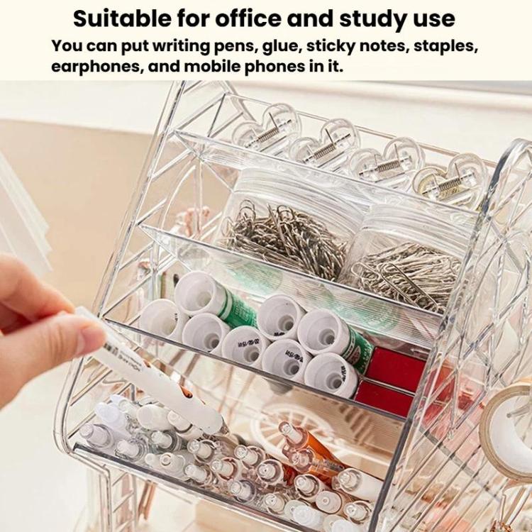 Clear rotating organizer box with divided sections holding small items